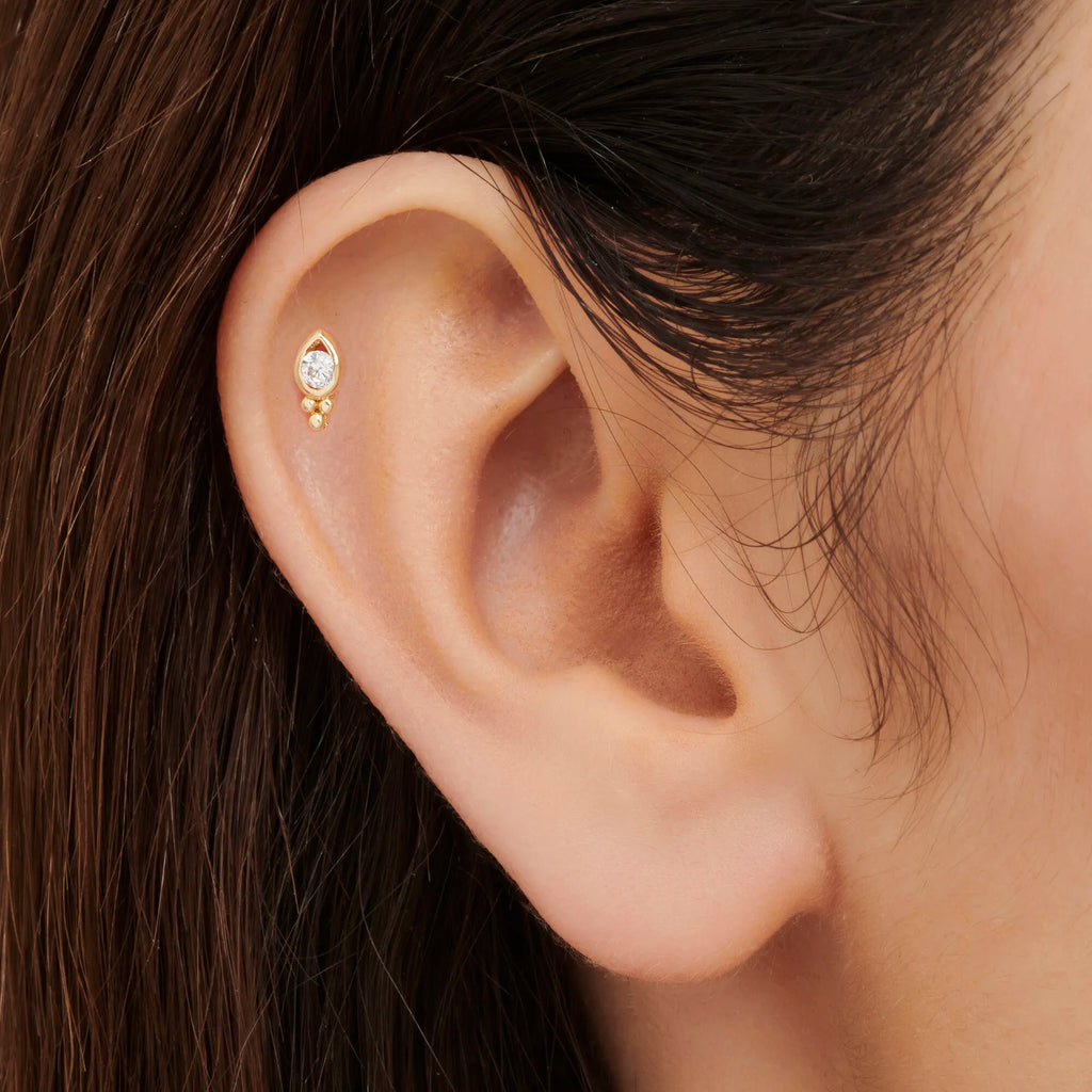 Gold Tragus Piercing